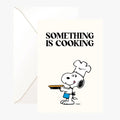 Carte Double Peanuts « Something Is Cooking » avec Snoopy 👨‍🍳