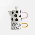 Ensemble théière et tasse en céramique à motifs de pois et de cœurs
