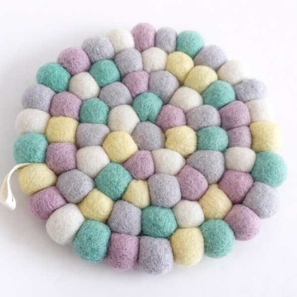 Dessous de plat design en laine – Coloré & graphique