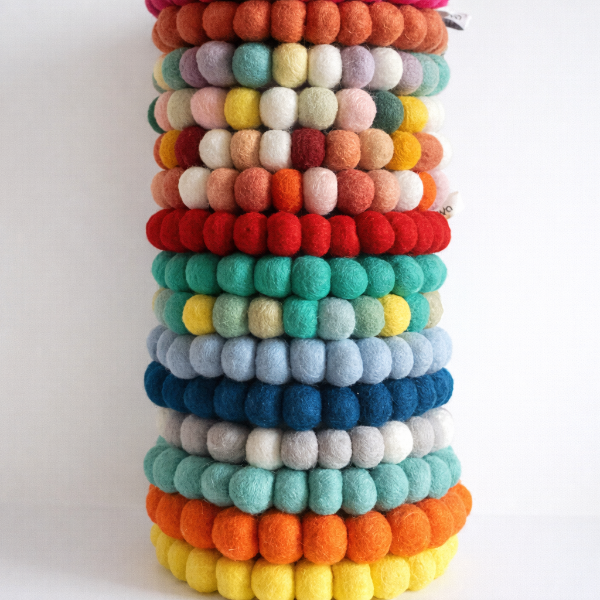 Dessous de plat design en laine – Coloré & graphique