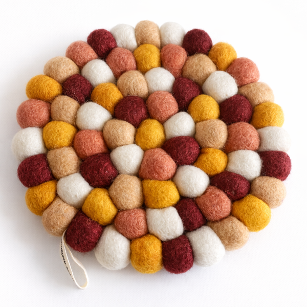 Dessous de plat design en laine – Coloré & graphique