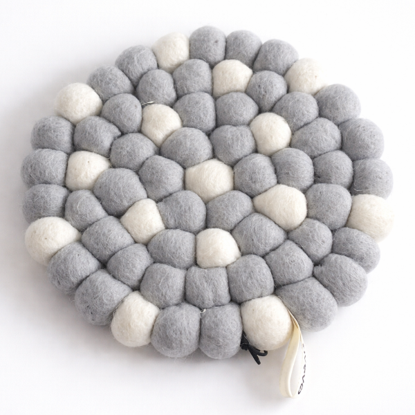 Dessous de plat design en laine – Coloré & graphique