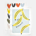 Lot de 2 torchons de cuisine à motifs banane/cœurs Caroline Gardner